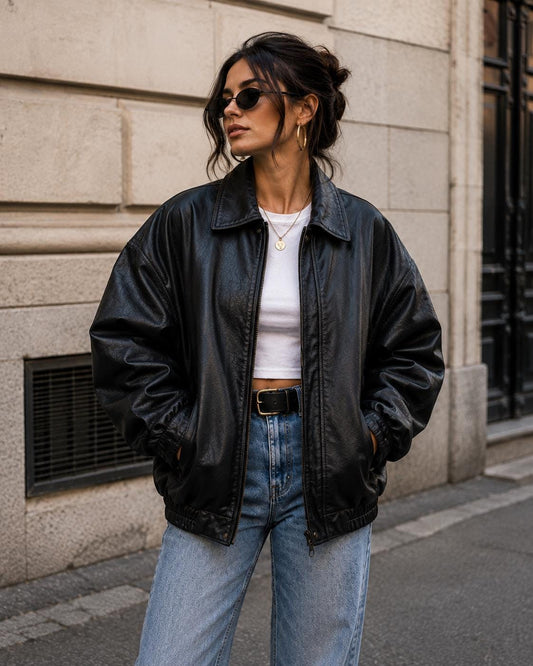 Women’s oversized black leather bomber jacket, front view