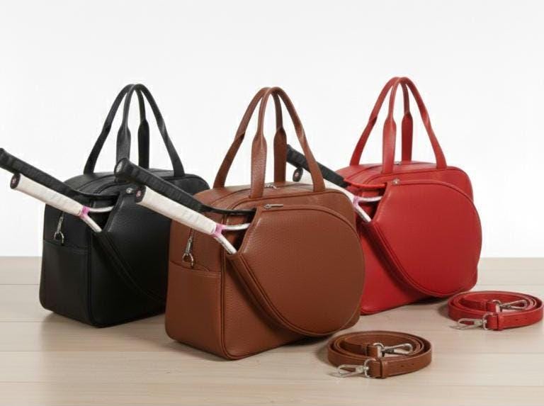 Red leather tennis racket duffel bag by Premium Skin